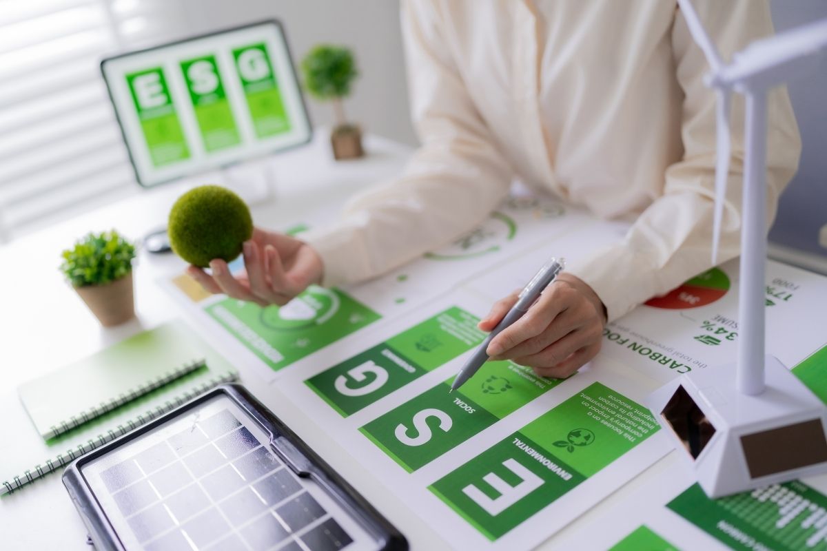 Office desk featuring a green presentation on sustainability
